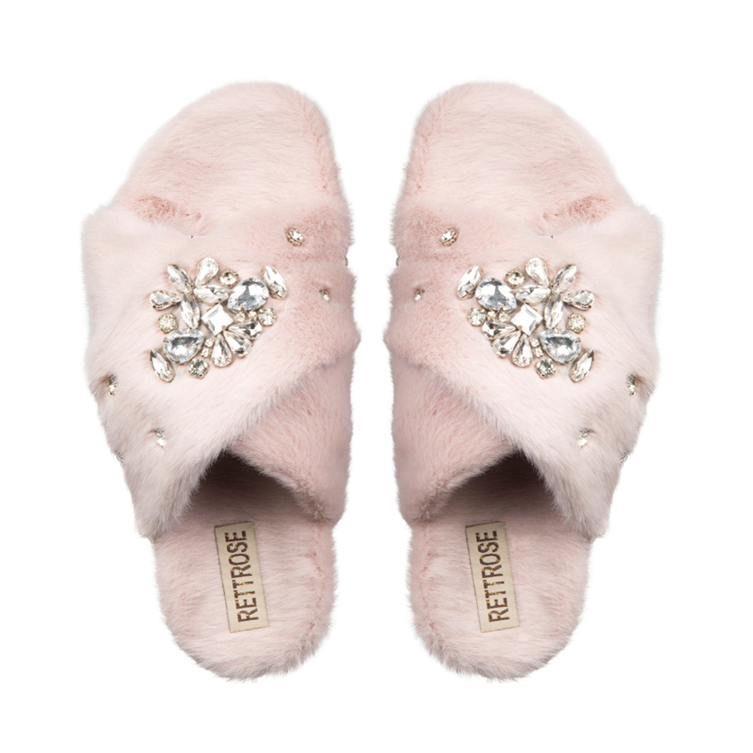 A pair of dusky pink luxury plush slippers with diamanté embellishments and a hand-held love appliqué.
